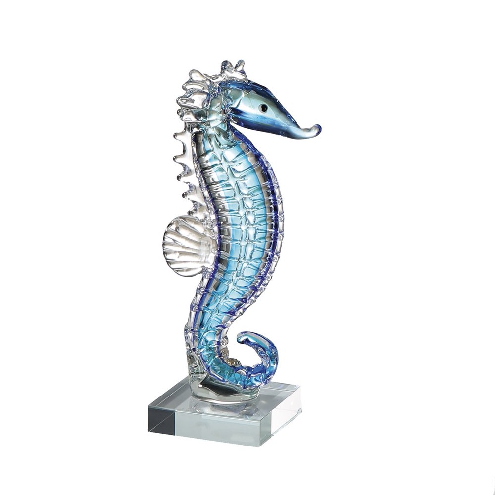 Glass seahorse figurine on a white background