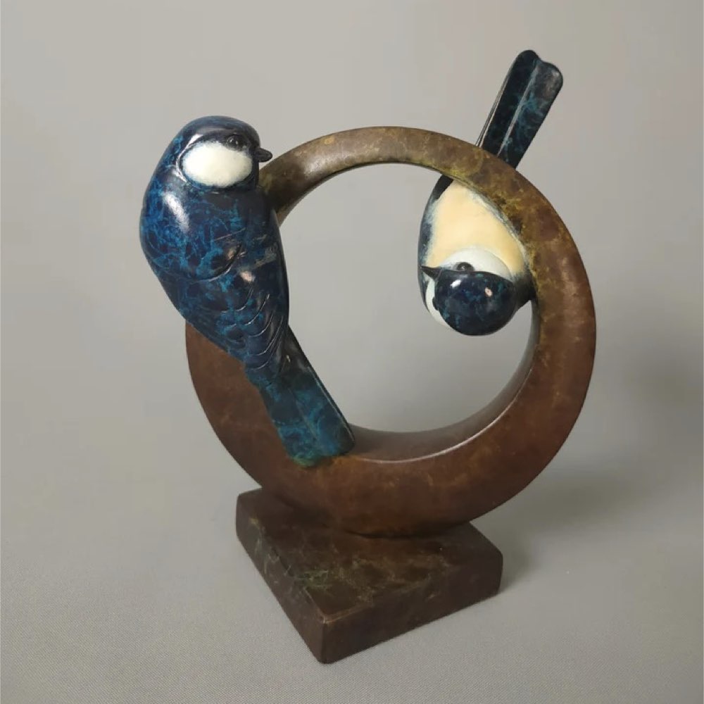 Bronze sculpture of two Blue Tits.