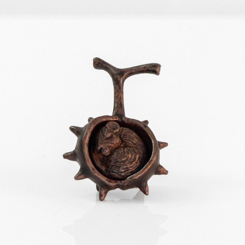 Bronze mouse in a bronze conker