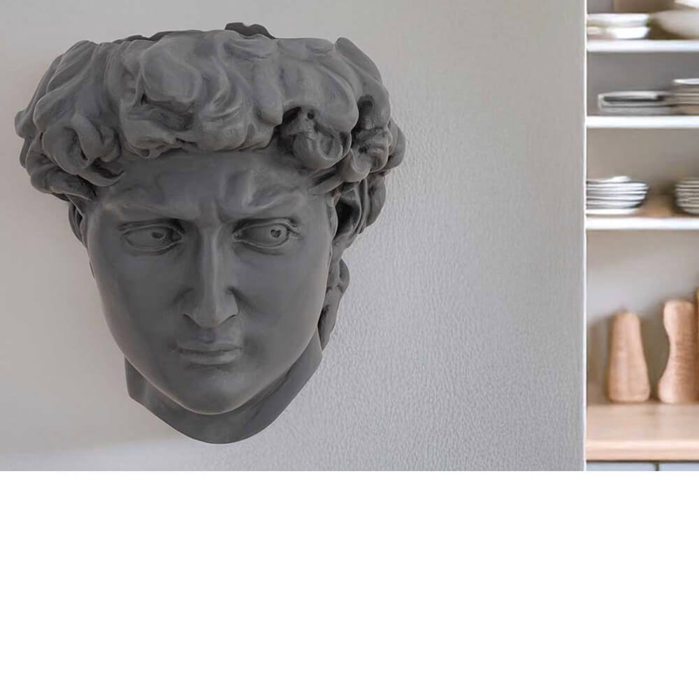 David wall planter in cool grey with trailing plants, sculptural stone-effect wall-mounted planter for herbs and succulents