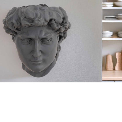 David wall planter in cool grey with trailing plants, sculptural stone-effect wall-mounted planter for herbs and succulents