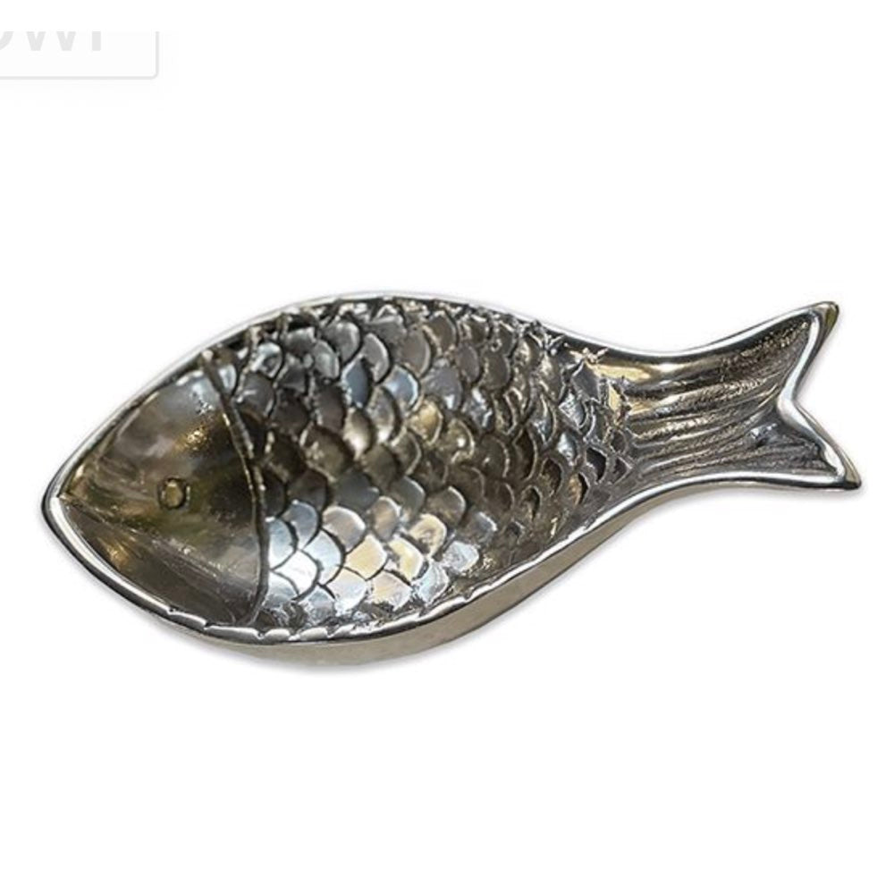 Fish-shaped metal dish on a white background