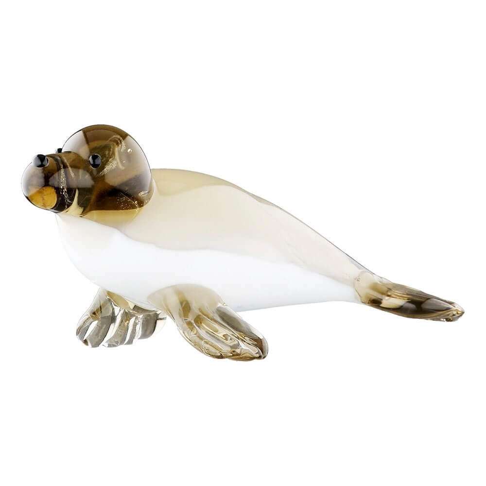 Glass sculpture of a bird on a white background