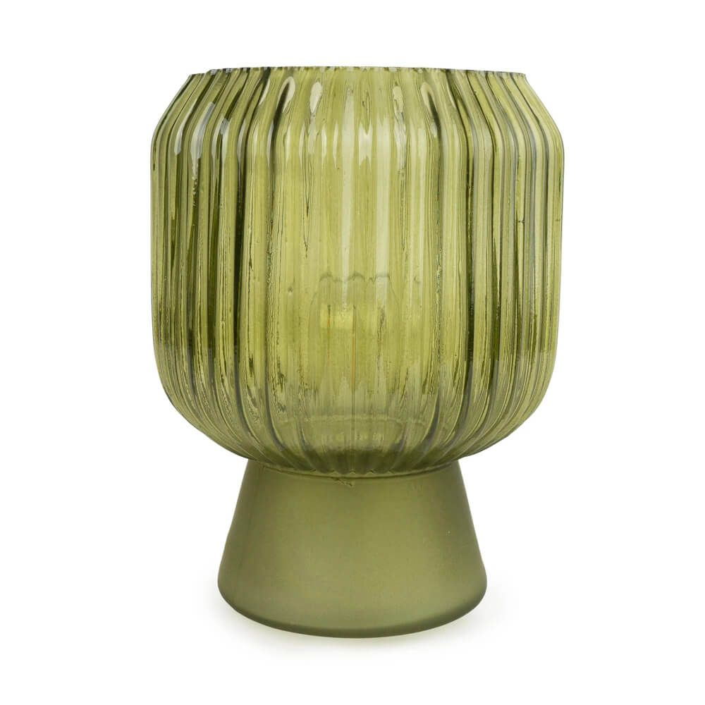 Green ribbed glass table lamp on a white background