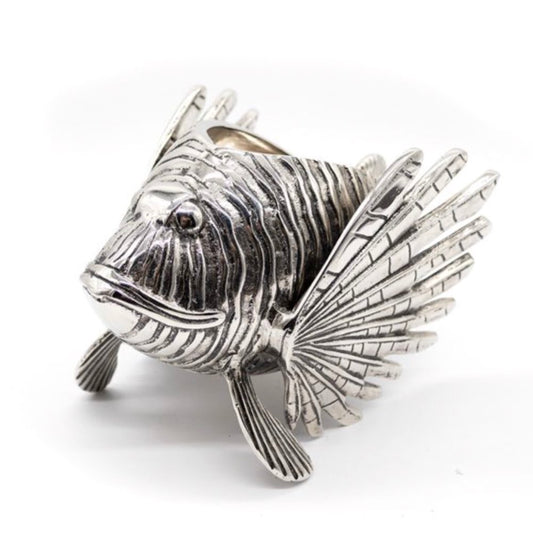 Silver fish-shaped object on a white background