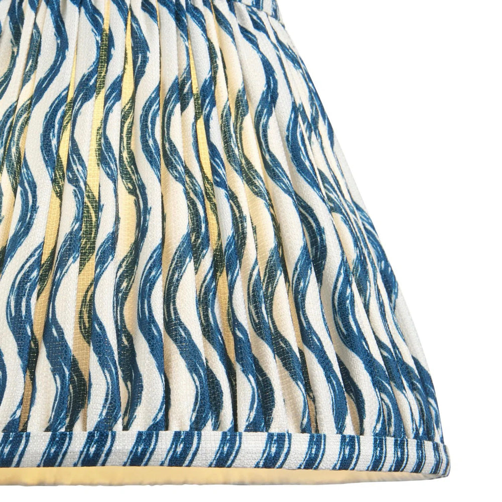 Ocean spray ceramic table lamp with marlin blue Ikat patterned tapered shade for bedroom and lounge interiors