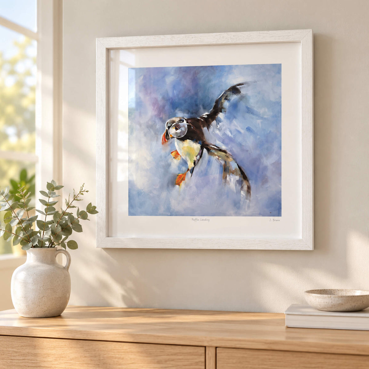 Puffin Landing | Framed Print by Julie Brunn
