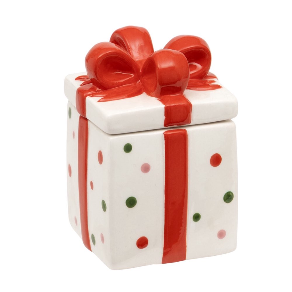 Decorative box designed like a gift with a red bow and polka dots on a white background