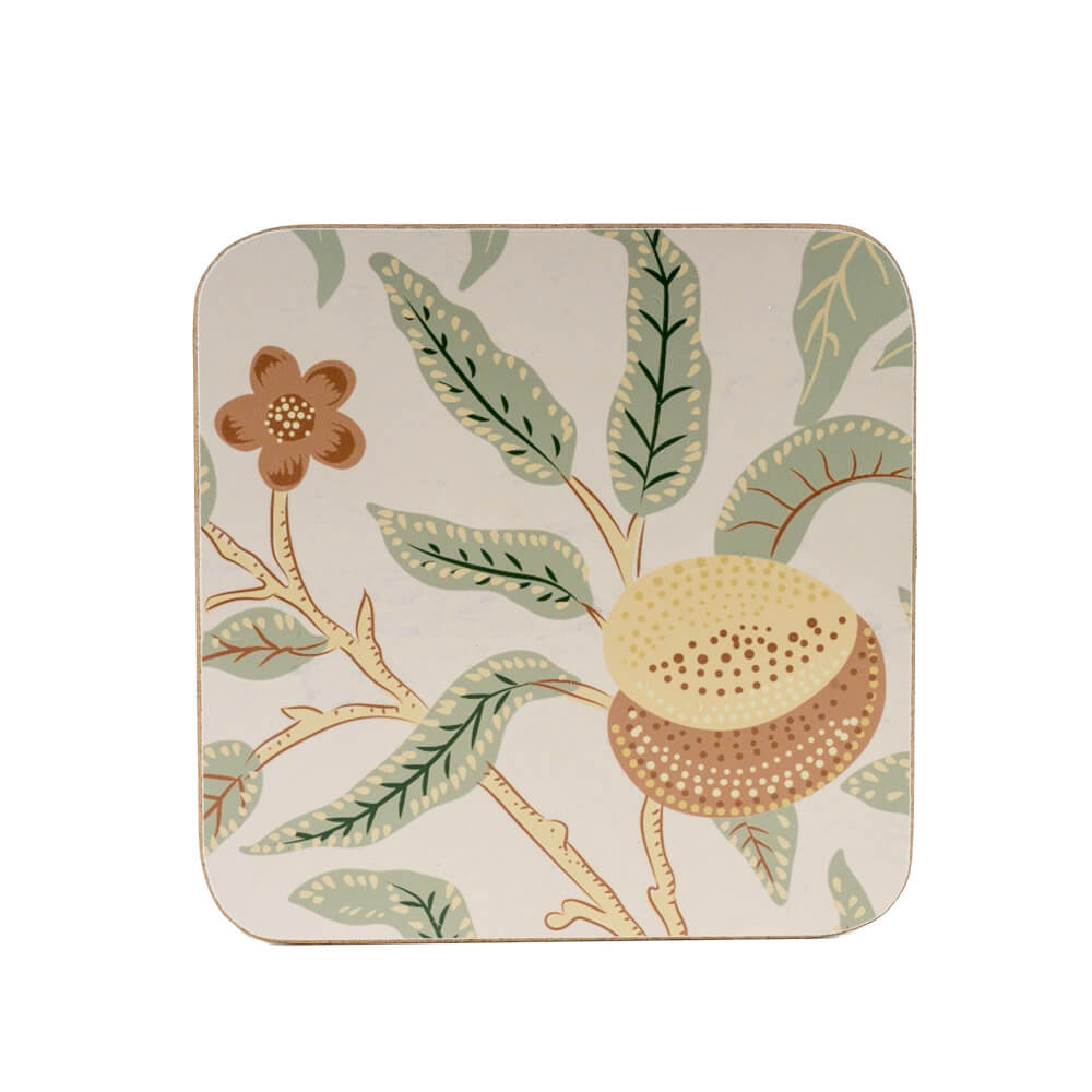 Square cork coaster with floral design on a white background