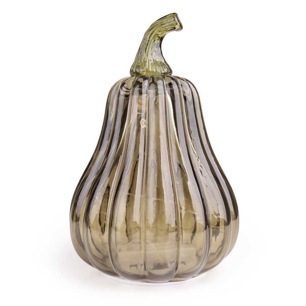 A ribbed glass pumpkin decoration in a smoky olive-brown color, shown on a clean white background.