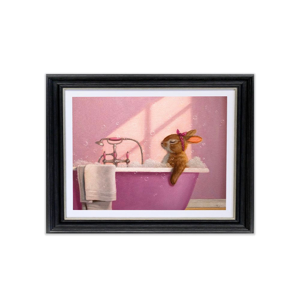 Framed artwork of a rabbit in a bathtub with a pink background