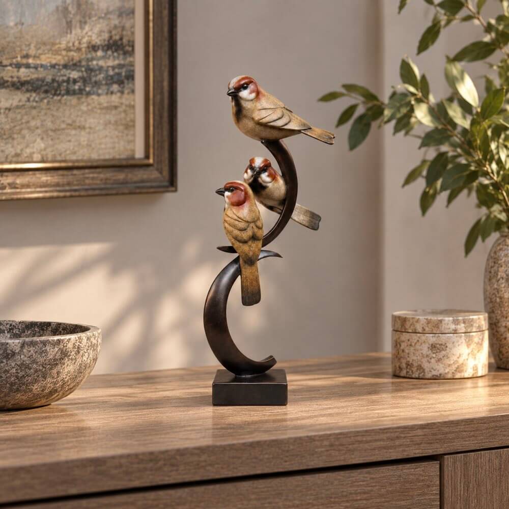 Three Bronze Sparrows perched, limited edition bronze by sculptor David Meredith. 