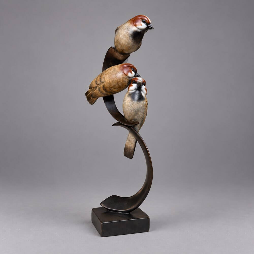 Three Bronze Sparrows perched, limited edition bronze by sculptor David Meredith. 