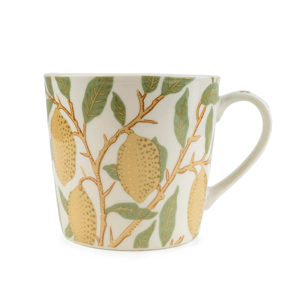 Mug with lemon and leaf pattern on a white background