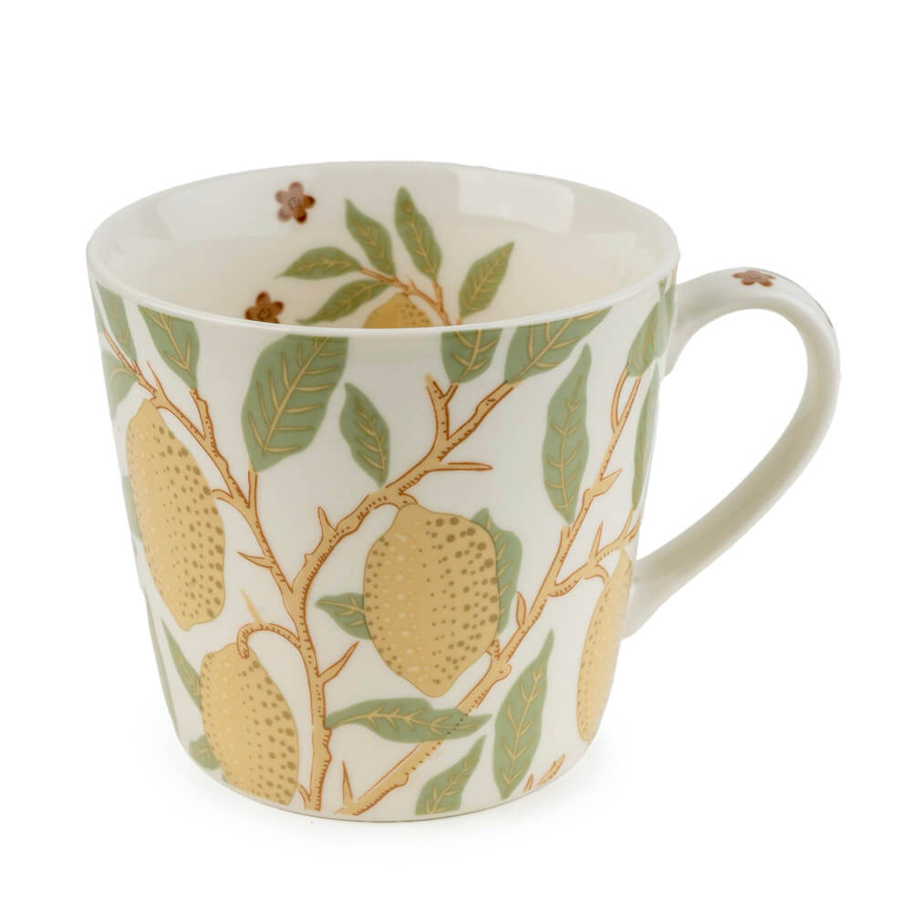 Mug with lemon and leaf pattern on a white background