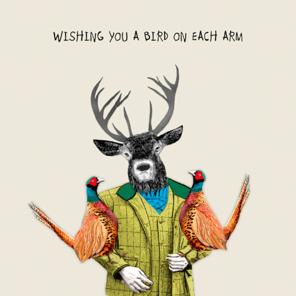 Illustration of a deer with antlers wearing a green jacket holding two birds, with text 'Wishing you a bird on each arm' on a beige background.