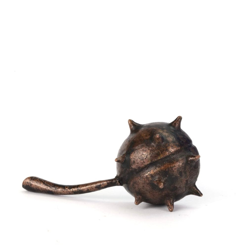 small bronze sculpture of back of conker shell 