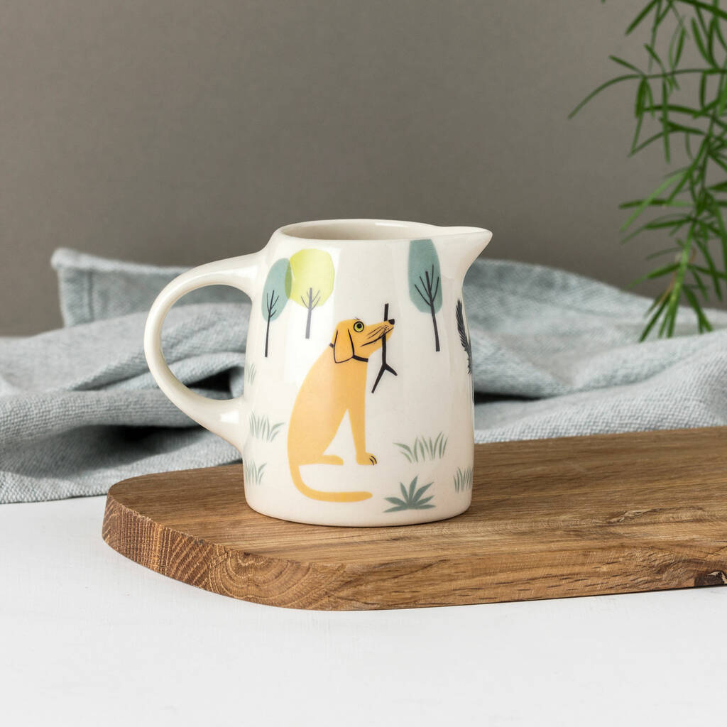 Side view of illustrated creamer dog jug 