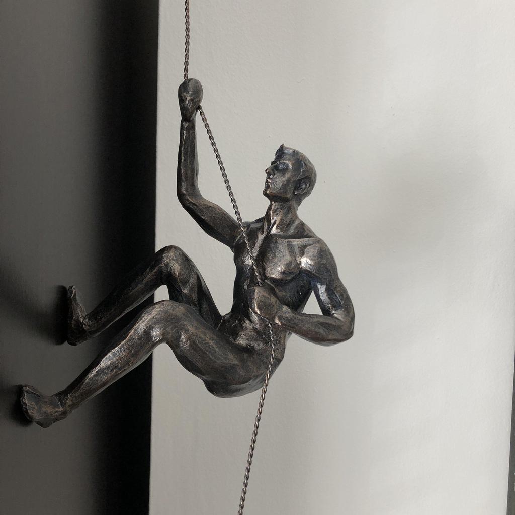 Climbing Man Sculpture