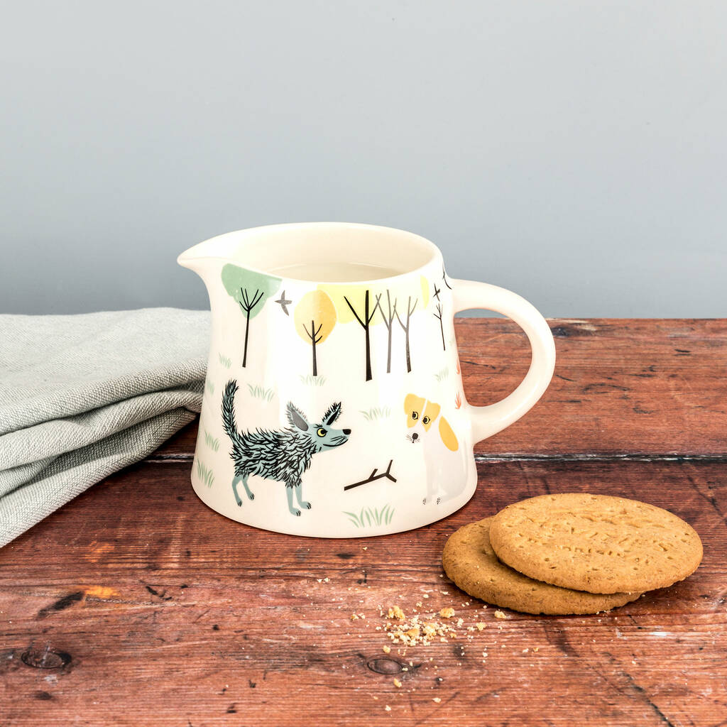 Ceramic Dog Milk Jug by Hannah Turner view with illustrated scruffy dog